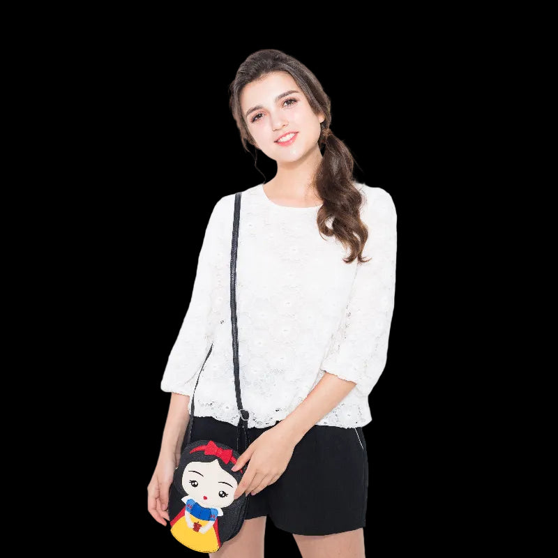 Woman holding a small bag with a cartoon character on a white background