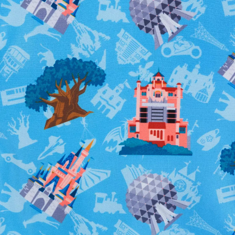 Patterned fabric with colorful architectural and natural elements on a blue background