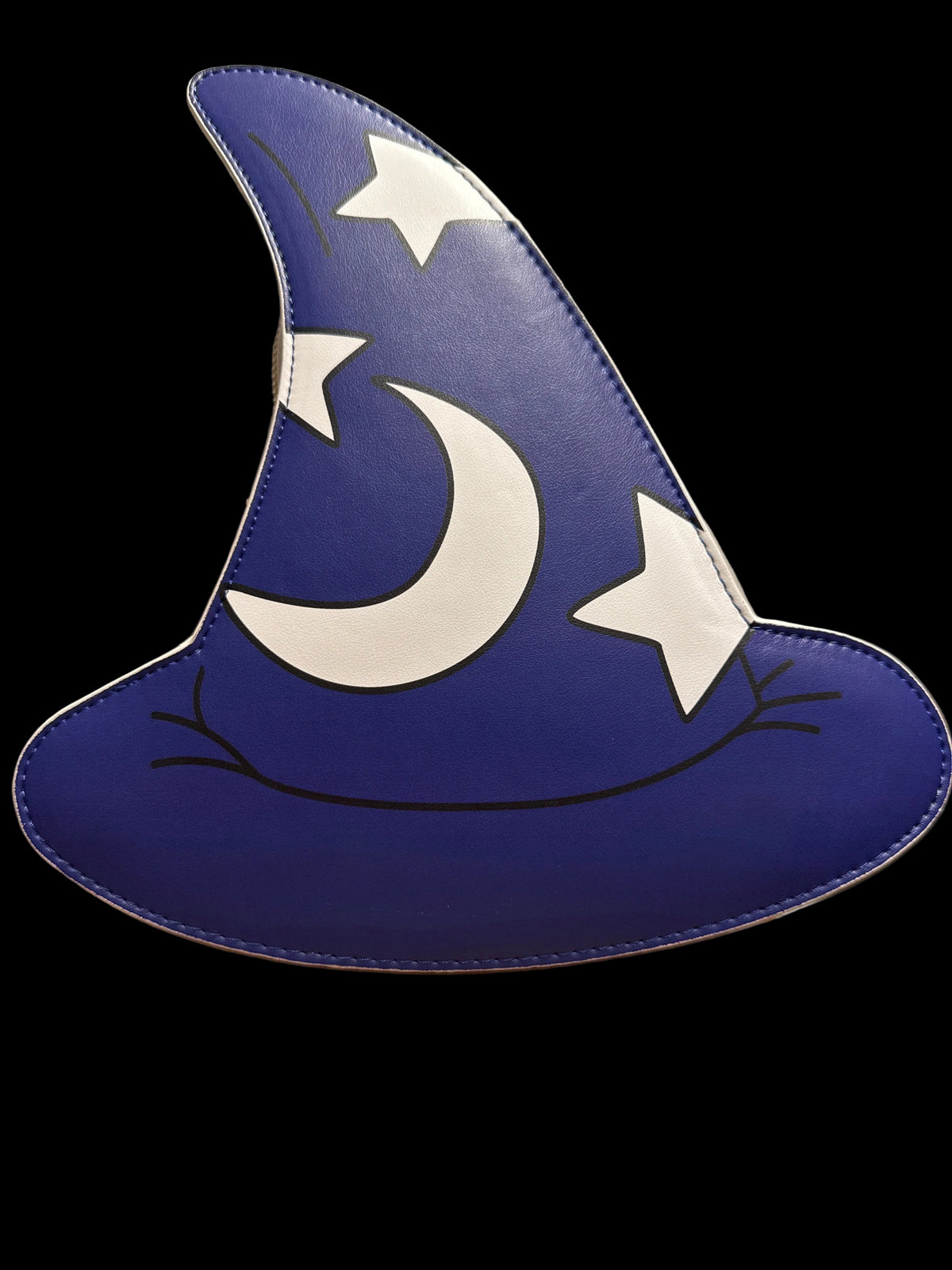 A blue wizard hat shaped wall plaque or decor piece with a white crescent moon and stars, displayed on a cardboard box against a beige wall.