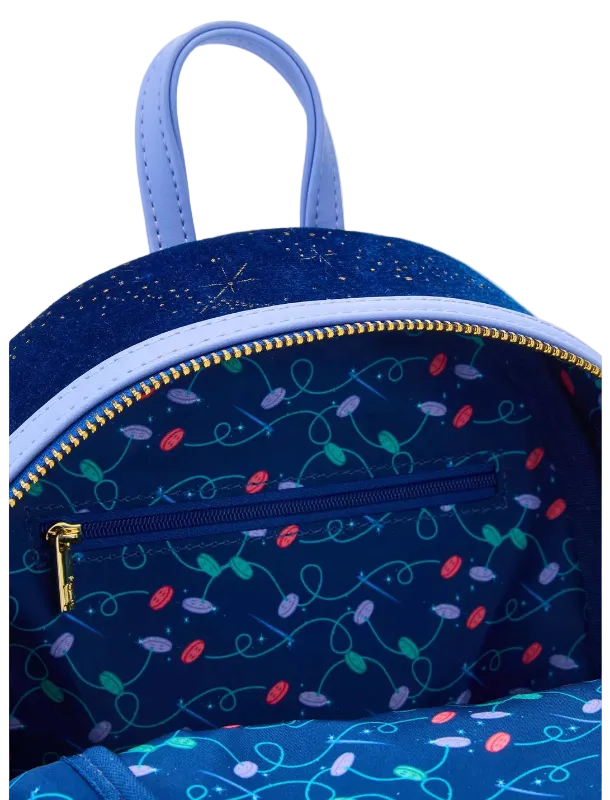 Blue backpack with colorful light bulb pattern on a white background