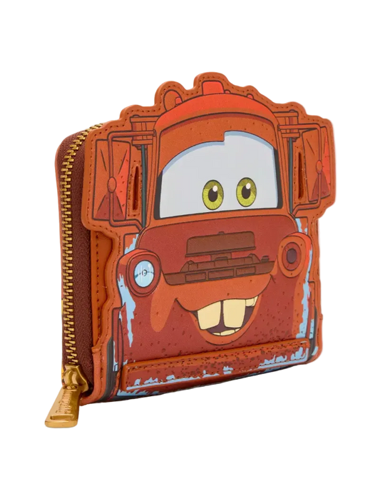 A zip-around wallet shaped like the character Mater from Disney's Cars, featuring a distressed orange-red finish with blue paint details, yellow eyes, and a gold zipper pull, shown on a light gray background.