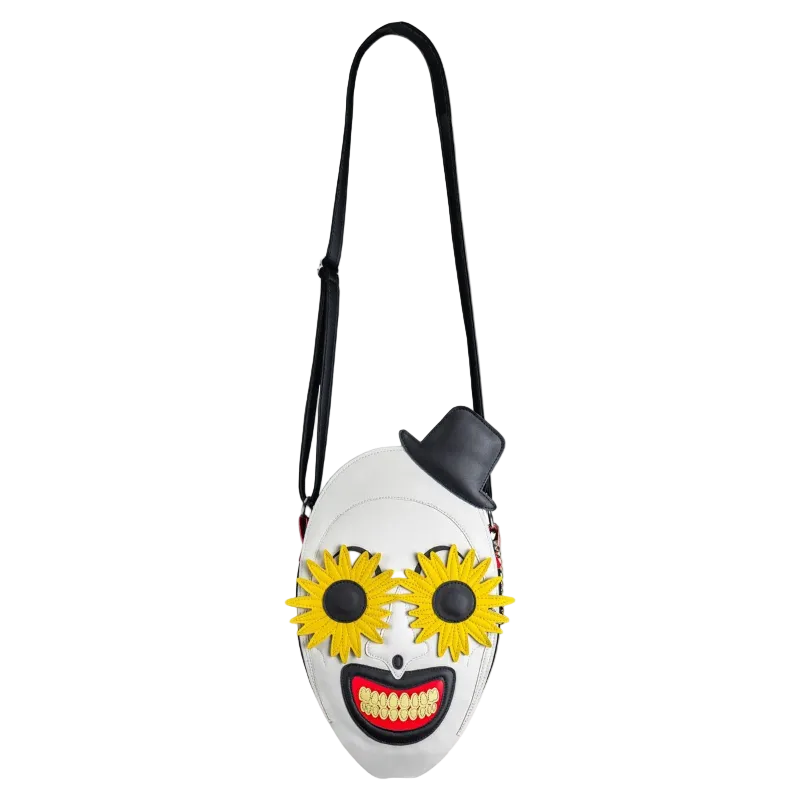 Masked character pouch with yellow flowers and red mouth on a white background
