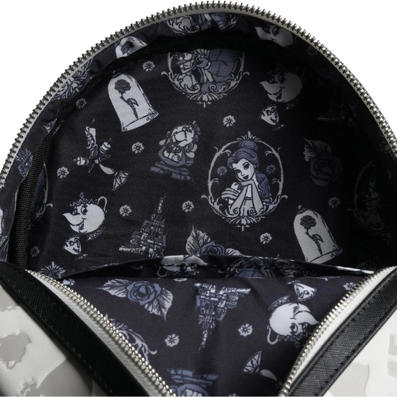 Backpack with black and white pattern of animated characters, open to reveal lining.