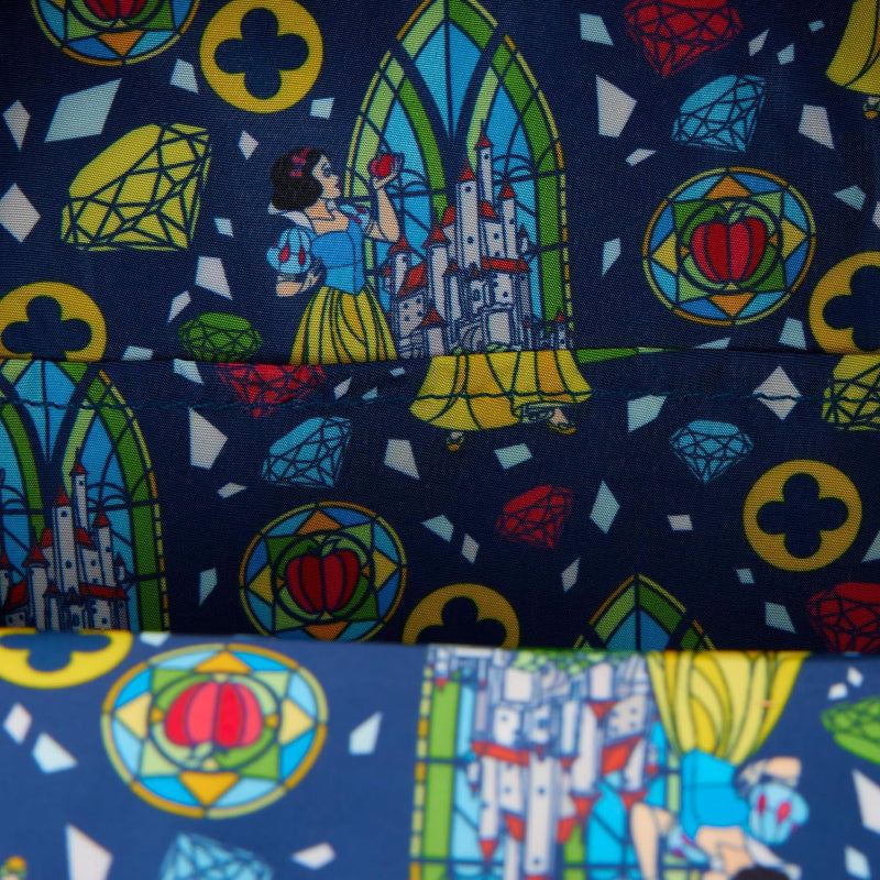 Colorful fabric pattern with cartoon characters, stained glass windows, and castle design on a blue background.