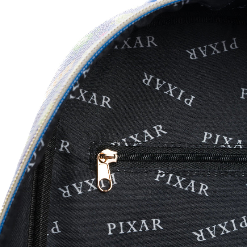 Close-up of a black bag with 'Pixar' logo pattern, featuring a gold zipper.