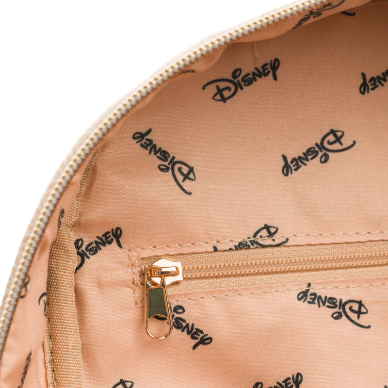 Close-up of a beige bag with Disney logo pattern