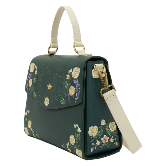 Green handbag with floral embroidery on a white background