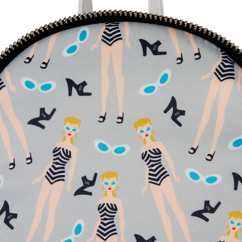 Patterned product with illustrations of women, high heels, and sunglasses on a gray background.