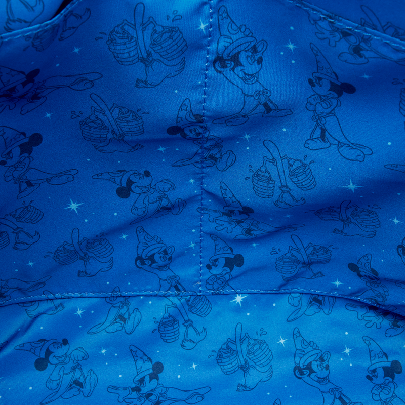 Blue fabric with black cartoon character pattern and star-like embellishments