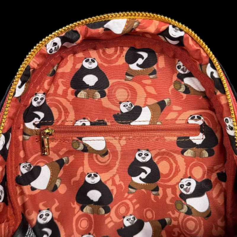 Backpack with panda pattern on an orange background