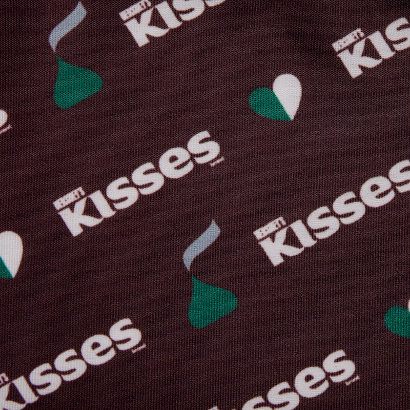 Close-up of Hershey's Kisses logo pattern on a dark background