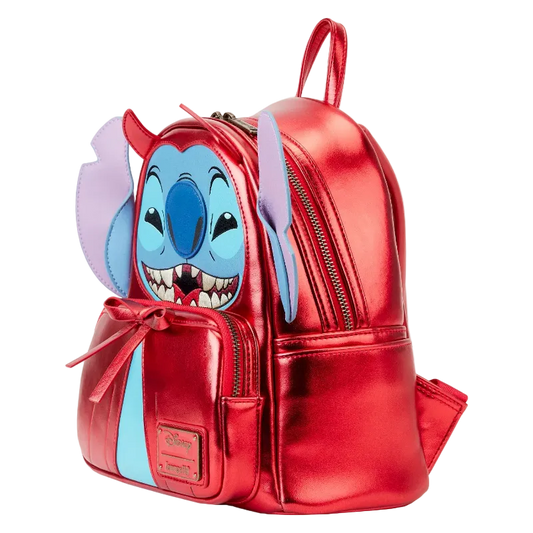 Red metallic backpack with cartoon character face on a white background
