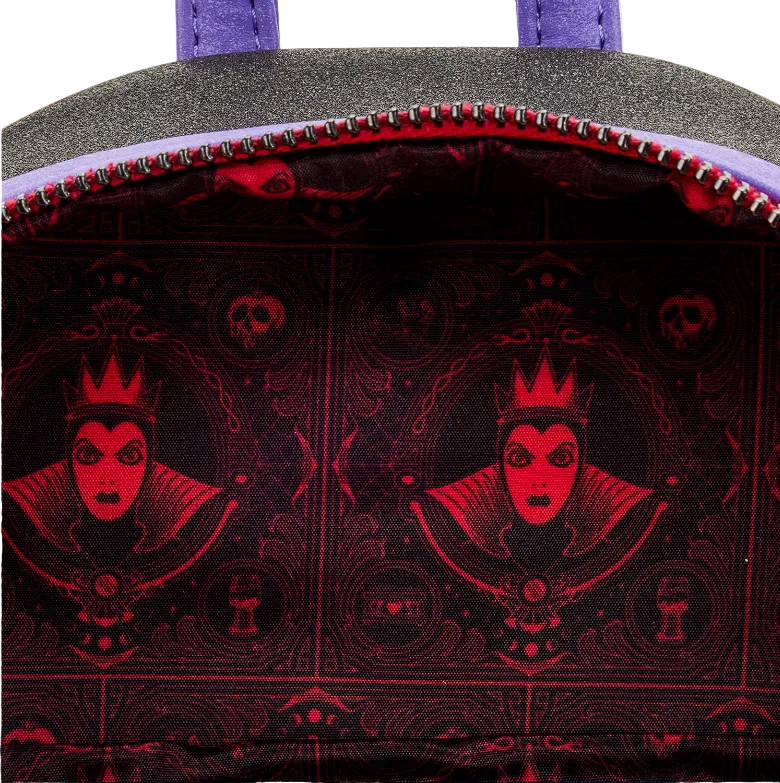 Backpack interior with red and black pattern featuring a character with a crown and dark hair.