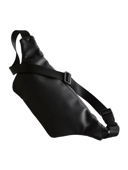 Black leather waist bag on a light gray background