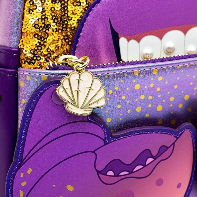 Purple character purse with gold shell charm and sequin detail