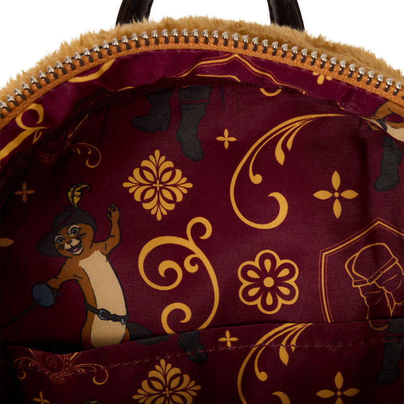 Close-up of a bag with Aladdin and the Magic Lamp design on a maroon background.