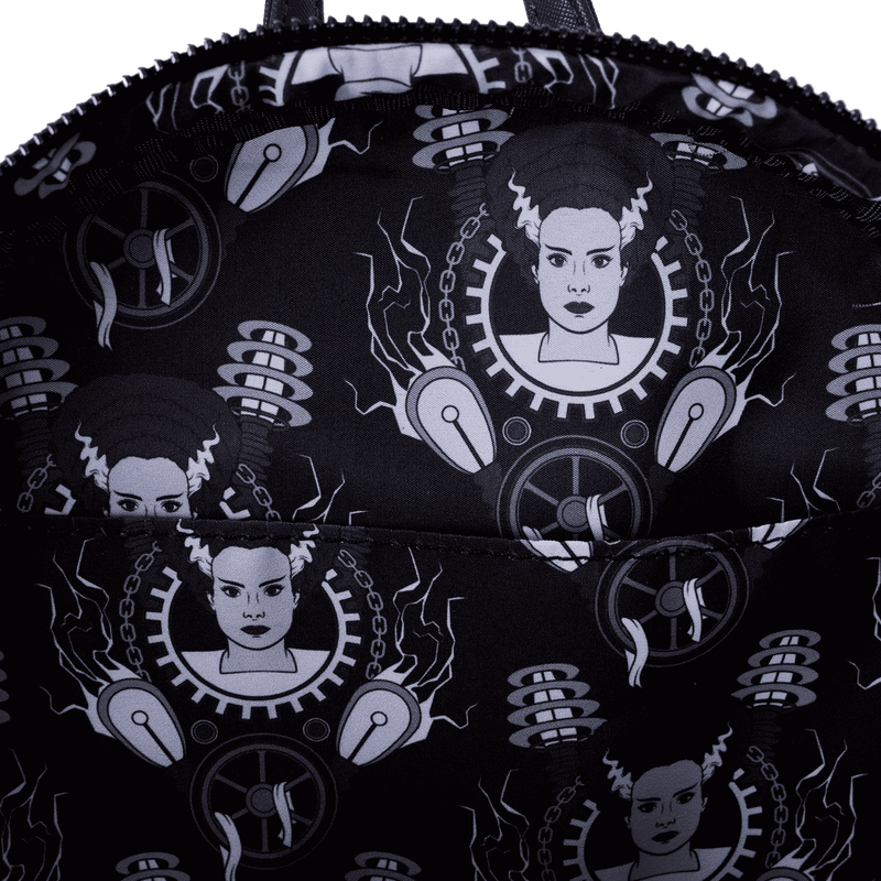 Black backpack with white graphic design of a woman's face and mechanical elements.