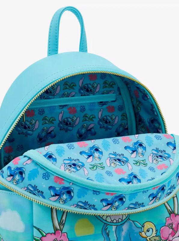 Blue backpack with cartoon character pattern on a white background