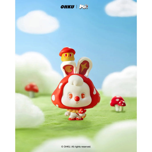 Toy figure with red and white design standing on a grassy field with mushrooms and blue sky.