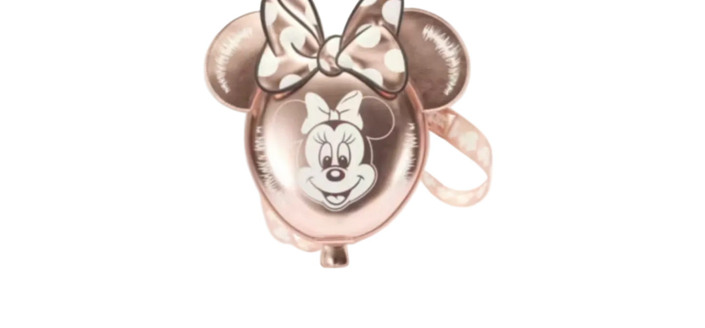 Rose gold Minnie Mouse balloon with bow on a white background