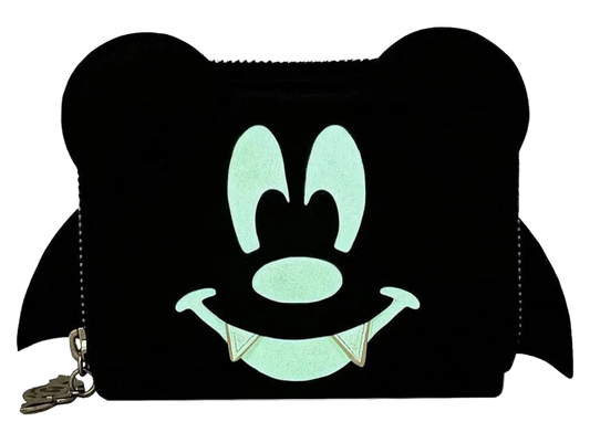 A black coin purse designed like a cartoon character's face with large round ears, a smiling mouth with fangs, and a small gold-tone zipper pull on a white background.