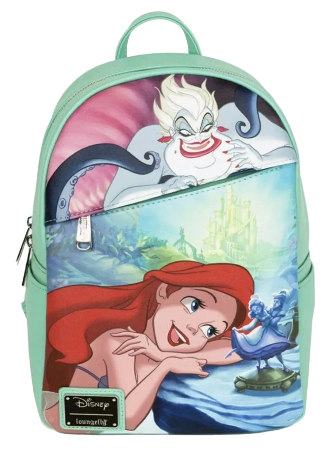 A Disney Toonyou backpack featuring a colorful graphic print of Disney's The Little Mermaid, with Ariel in the foreground and Ursula above, set against a mint green background.