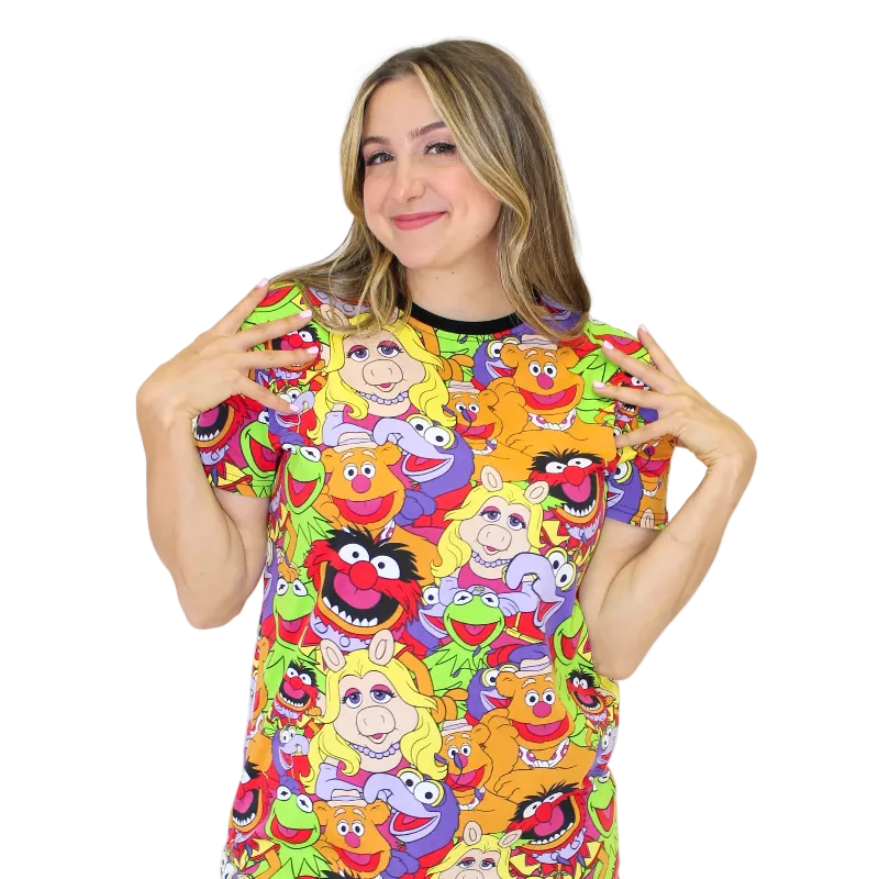 Woman wearing a colorful t-shirt with cartoon character design on a white background