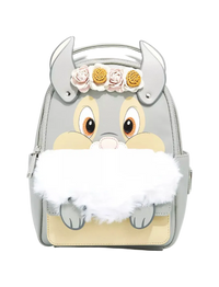 A light gray faux-leather backpack designed like a cartoon animal face with large eyes, a beige snout, gray horns, a white faux-fur beard, and three fabric flowers on the forehead, shown on a light gray background.