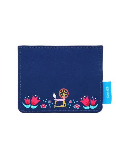 A navy blue wallet with a colorful embroidered design of a spinning wheel, flowers, and dots along the bottom, featuring a light blue 'glittery' brand tag on the right side.