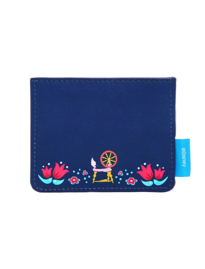 A navy blue wallet with a colorful embroidered design of a spinning wheel, flowers, and dots along the bottom, featuring a light blue 'glittery' brand tag on the right side.