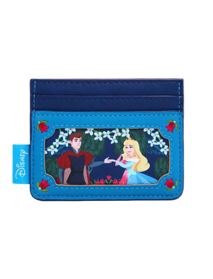A Disney card holder wallet featuring a blue faux leather design with a central character illustration of Snow White and Princess Aurora under a floral arch, with a blue Disney tag on the left side.