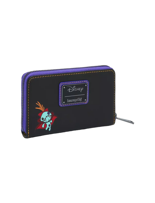 A black zip-around wallet with purple trim, featuring a purple Disney Treasure Tiki patch and a small colorful character graphic on the front, shown on a light gray background.