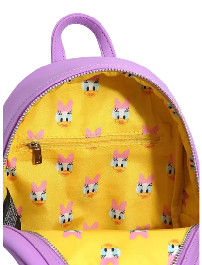 Backpack with yellow interior and pink exterior, featuring a cartoon character pattern.
