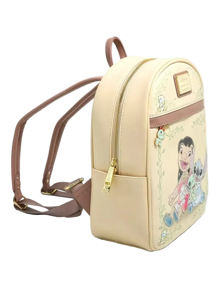 A small cream-colored faux leather backpack featuring brown straps and gold-tone hardware, decorated with a cartoon character illustration of Daisy Duck and Stitch on the front pocket.