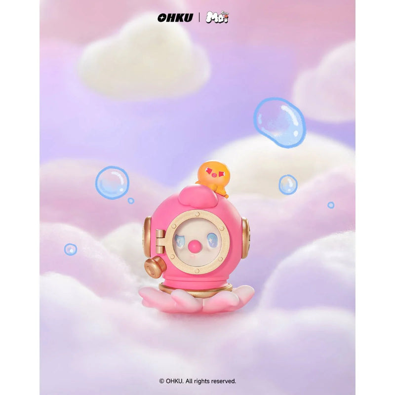Pink robot toy with a cloud and bubble background, featuring the brand 'OHKU'.