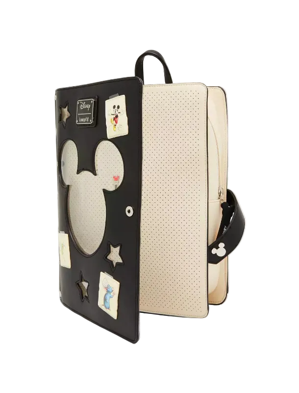 Backpack with decorative patches on a white background