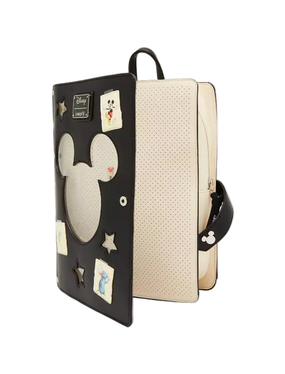 Backpack with decorative patches on a white background