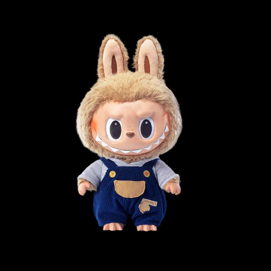 Toy figure with bunny ears and overalls on a white background