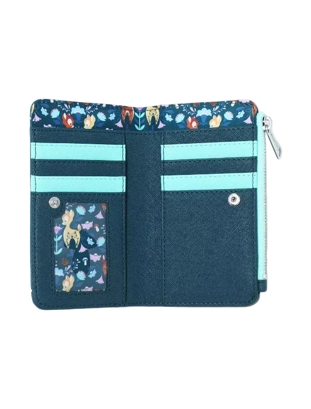 A dark teal bi-fold wallet with a colorful floral patterned interior lining, light aqua blue card slots, and a matching light aqua zipper pull, shown open on a white background.