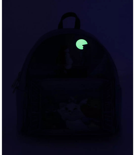 Backpack with a glowing green circle on a dark background