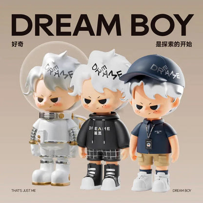 Three toy figures with 'Dream Boy' branding on a beige background