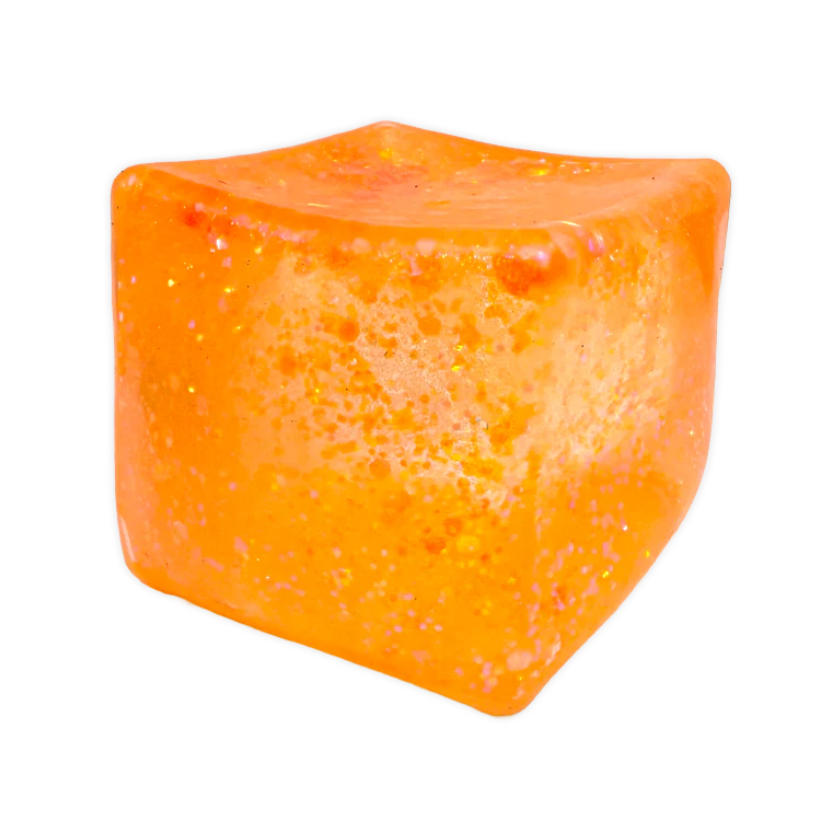Orange cube with a textured surface on a white background