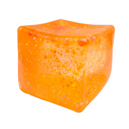Orange cube with a textured surface on a white background