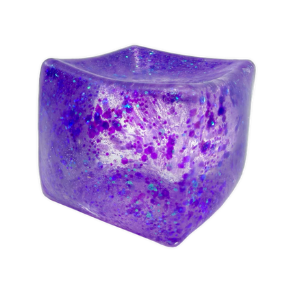 Purple glittery cube on a white background