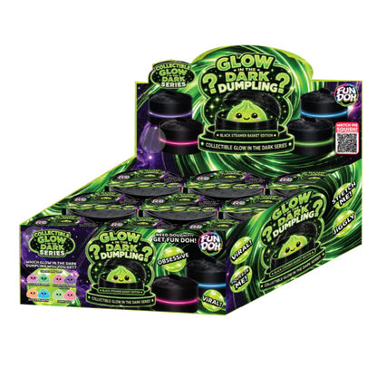 Box of Glow in the Dark Dumpling collectibles with green and black packaging.