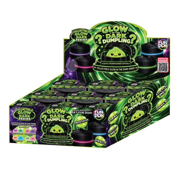 Box of Glow in the Dark Dumpling collectibles with green and black packaging.