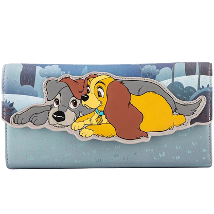 A wallet featuring a large graphic of Lady and Tramp cartoon dogs in a snowy winter scene, set against a light blue background.