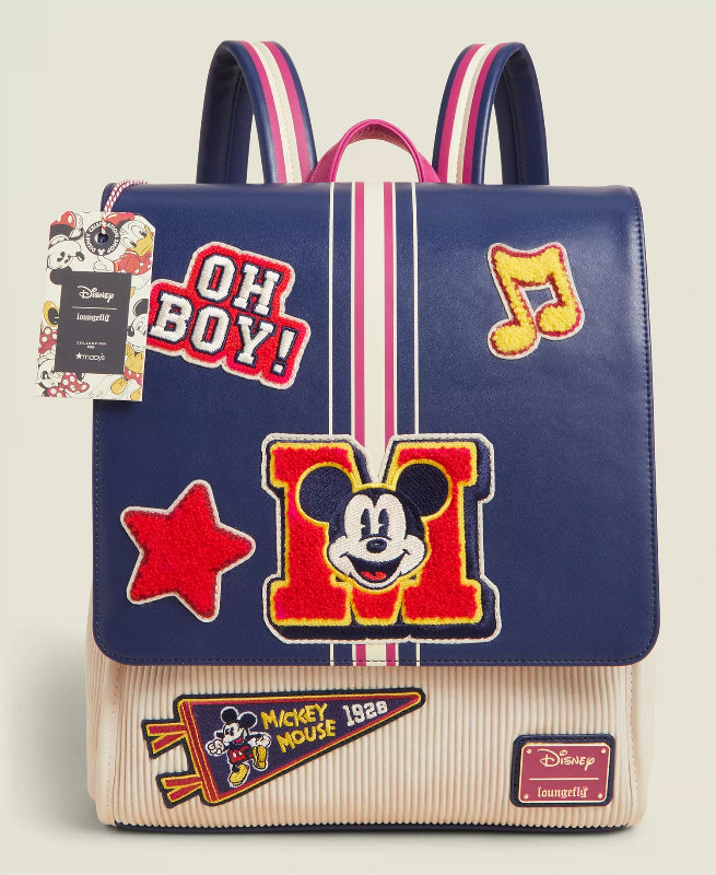 Backpack with Mickey Mouse patches and 'OH BOY!' text on a beige background