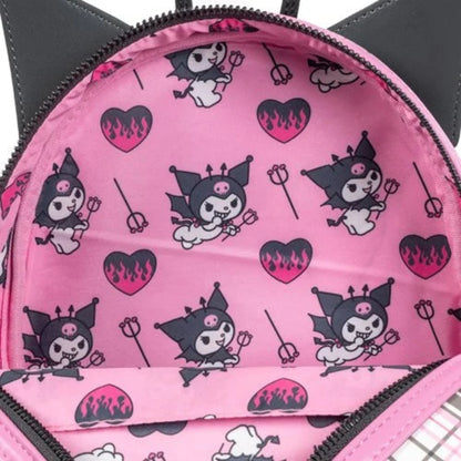 Pink backpack with black and white character and heart pattern