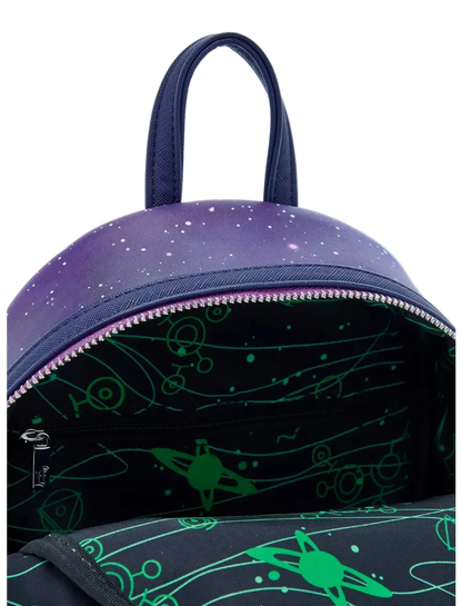 Close-up of a backpack showing the top handle, a purple galaxy-print exterior, a dark interior with a green space-themed pattern, and a silver zipper.